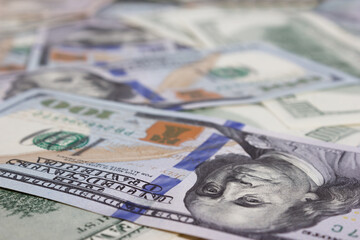 Bundle of dollars on the table close-up - texture, background