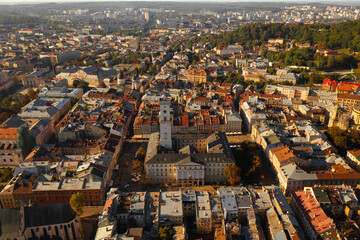 City panorama from above. Lviv, old European city. City hall, temples, buildings with red roofs and streets on a sunny day
