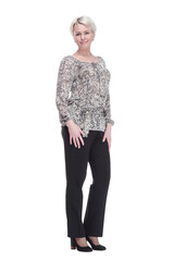 Fototapeta premium attractive young woman in trousers and blouse looking at you.