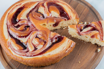 Sweet pie slices isolated on a wooden board