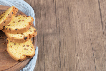 Soft yummy pie with mixed ingredients on a wooden board