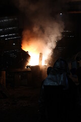 Casting iron molten metal into the sand mold. Casting and casting. Casting is the process in which solid metal shapes (casting) are produced by filling the cavities in the molds with liquid metal.