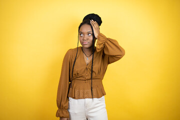 African american woman wearing casual clothes putting one hand on her head smiling like she had...