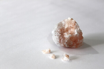 Obraz na płótnie Canvas Rock salt block indoor photography against white background