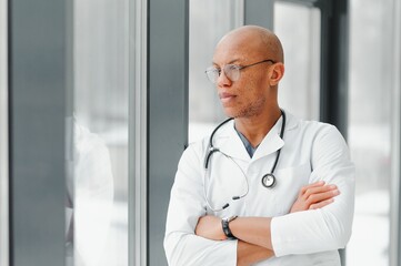 friendly african american doctor in modern office