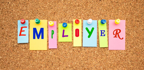 Color notes with letters pinned on a board. Word EMPLOYER.