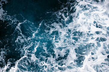 Aerial view to ocean waves.