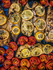 Grilled mackarell with lemons and cherry tomatoes