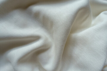 Crumpled simple white cotton jersey fabric from above
