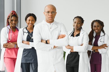 group of young african medical workers on white background