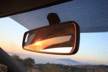 Sunset in the Rearview mirror