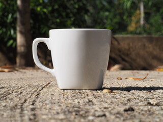 coffee mug on the cement floor