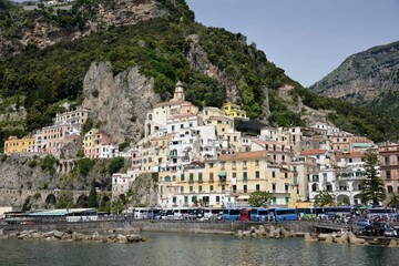 Fototapeta premium Amalfi is a city in an evocative natural setting beneath the steep cliffs on the southwestern coast of Italy. Between the 9th and 11th centuries, it was the seat of a powerful maritime republic.