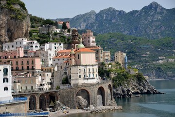 Fototapeta na wymiar Amalfi is a city in an evocative natural setting beneath the steep cliffs on the southwestern coast of Italy. Between the 9th and 11th centuries, it was the seat of a powerful maritime republic.