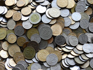 Pre-1999 Russian ruble coins in bulk on a plastic tray