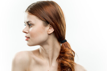 Naklejka premium red-haired woman with bare shoulders gathered hair cropped view glamor sexy