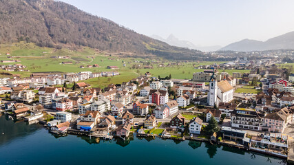 Drone pictures of the village of Arth on the lakeshores of lake Zug in the canton of Schwitz, Switzerland. 
