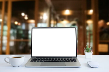 Front view of open laptop computer notebook with blank monitor white screen display on work table desk. Workspace office modern for job business online communication technology in shop or home indoor.