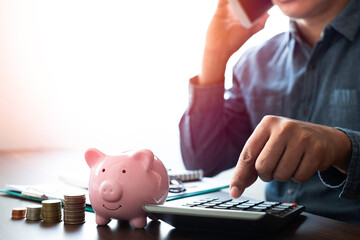 Close-up image of pink piggy bank with money stack step up growing growth. Planning step up, saving money for future plan, retirement fund. Business investment-finance accounting concept.