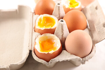 close up on boiled egg in box
