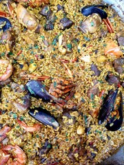 Typical Spanish rice dish. Paella from Ibiza, with seafood and chicken.