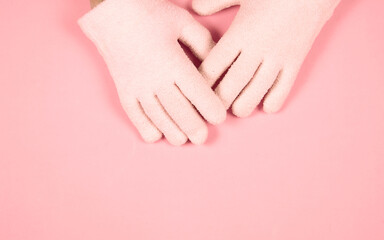 Obraz na płótnie Canvas Spa gel moisturizing gloves on pink background with copy space for design. Skin care and beauty routine concept.