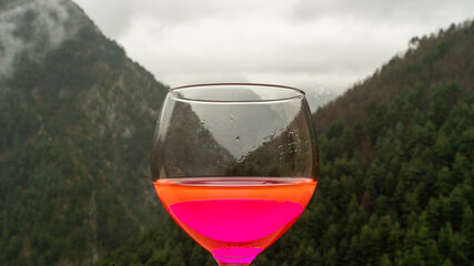 glass with new post covid drink with strong fluor color