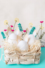 easter card, easter eggs in a basket, floral background