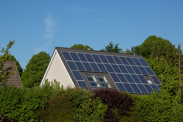 solar panels on a roof, solar power generation, copy space	