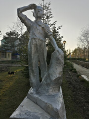statue of the person in the cemetery