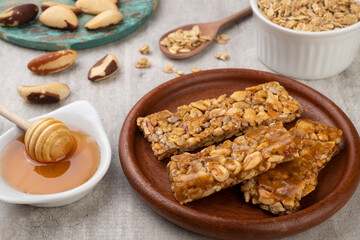Homemade cereal bars with nuts, muesli and honey