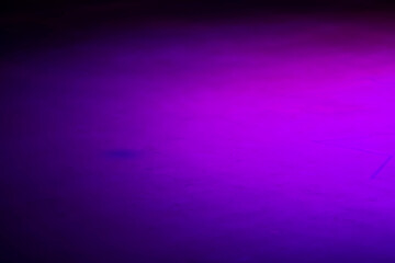 Blurred background with violet-black gradient.