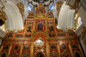 Fototapeta na wymiar Gold decoration in St. Andrew's Temple, interior, icon on the wall, Kiev