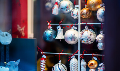 Beautiful decoration. Shopping on traditional Christmas market in european city. Illumination and decorations. Traditional christmas market in the historic center. Festive fair on background.