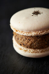 Delicious creamy macaroons on marble 