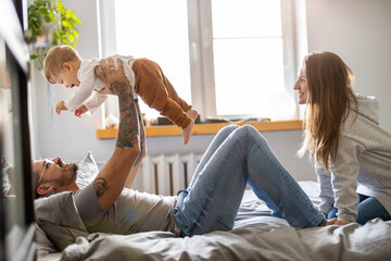 Young family having fun together at home
