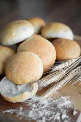 Homemade rolls and grains on a table