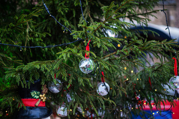 Decorated Christmas tree on blurred background. Christmas market in Maastricht, Netherlands.