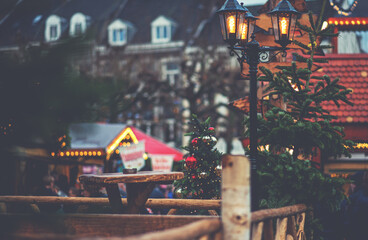 Christmas holidays decorations with lights. Festive illumination and decorations on Christmas market of Maastricht, Netherlands. Festive decorations on streets.