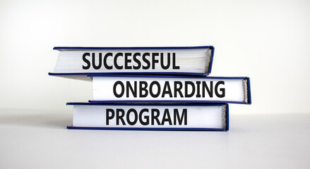 Successful onboarding program symbol. Books with words 'Successful onboarding program' on beautiful...