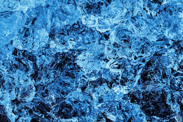 A close up of ice on a black background