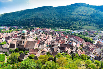 Fototapeta na wymiar Beautiful Kaysersberg village which is considered one of the most charming cities in Alsace, with old style half-timbered houses. Summer in France