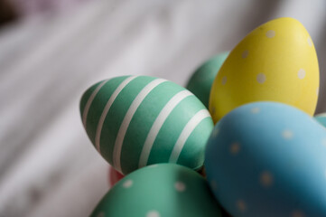 Close-up of Easter decorative multicolored eggs with patterns.