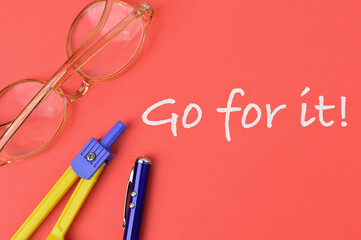 Red background written with text GO FOR IT.