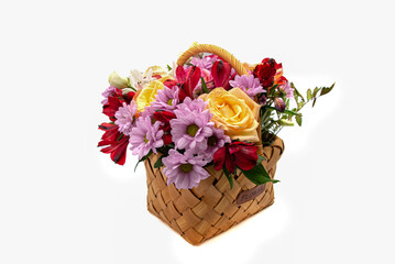 Fototapeta na wymiar Bouquet of flowers in a basket on a white background