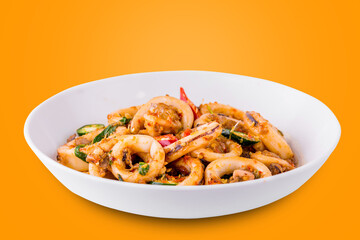 Spicy fried squid with basil leaves