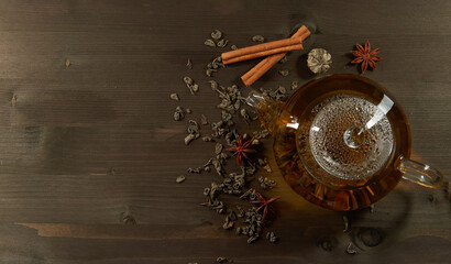 Glass teapot with tea. Flat lay