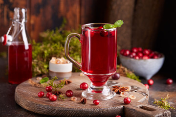 Healthy cranberry juice drink and fresh cranberries. Traditional Russian beverage mors. Cranberry tea. © natkinzu