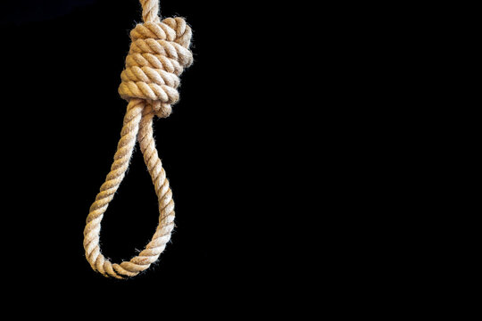 Suicide, hanged in the room concept. Psychology of suicide and suicidal severe depression therapy as a mental illness health concept, a thick rope noose