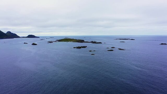 Aerial drone view of small rocky islands, outside the coast of Sto, Vesteralen, Norway